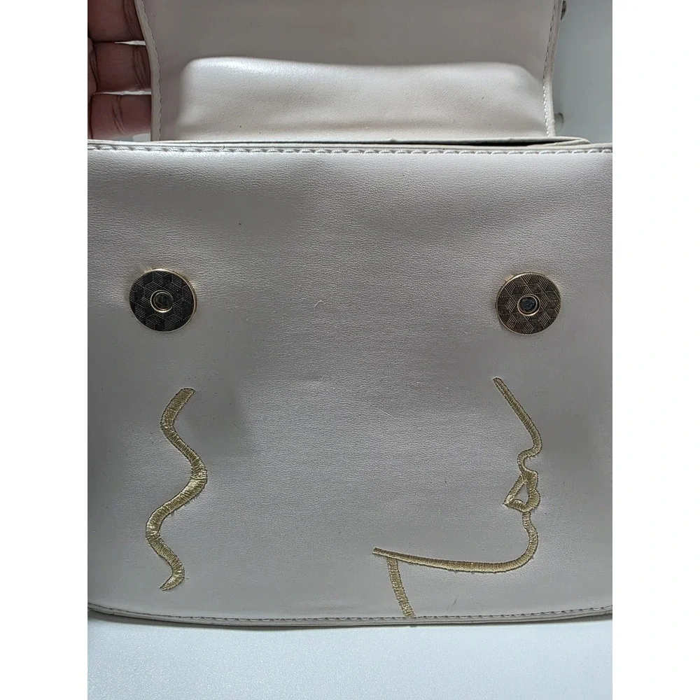 White Structured Top Handle Purse Gold Embroidered Abstract Face Chain Strap Bag